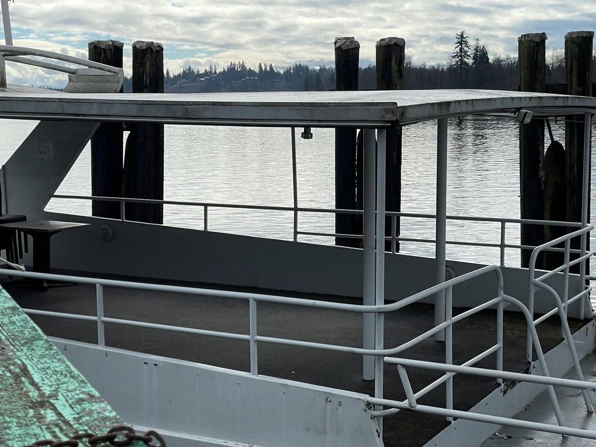 a balcony with a railing and railing aboard MAGIC MOMENT Yacht for Sale