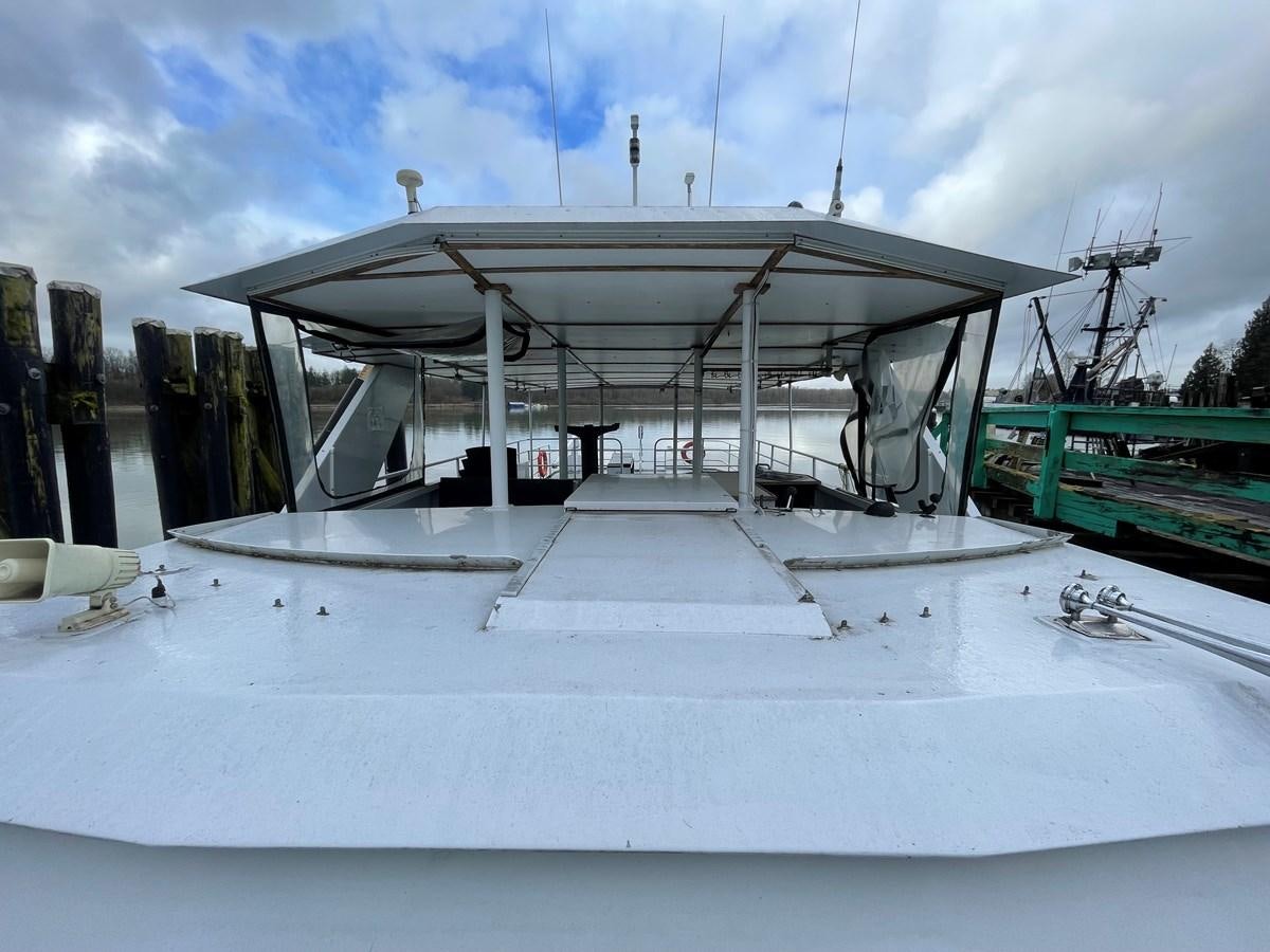 a large white building aboard MAGIC MOMENT Yacht for Sale