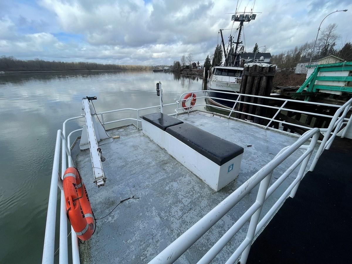 a large ship on a body of water aboard MAGIC MOMENT Yacht for Sale