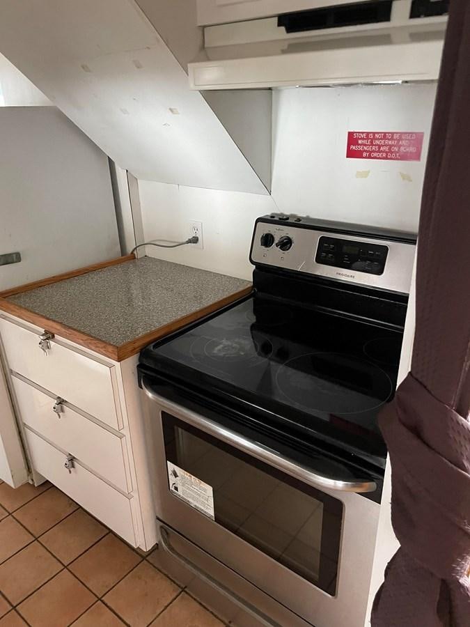 a stove in a kitchen aboard MAGIC MOMENT Yacht for Sale