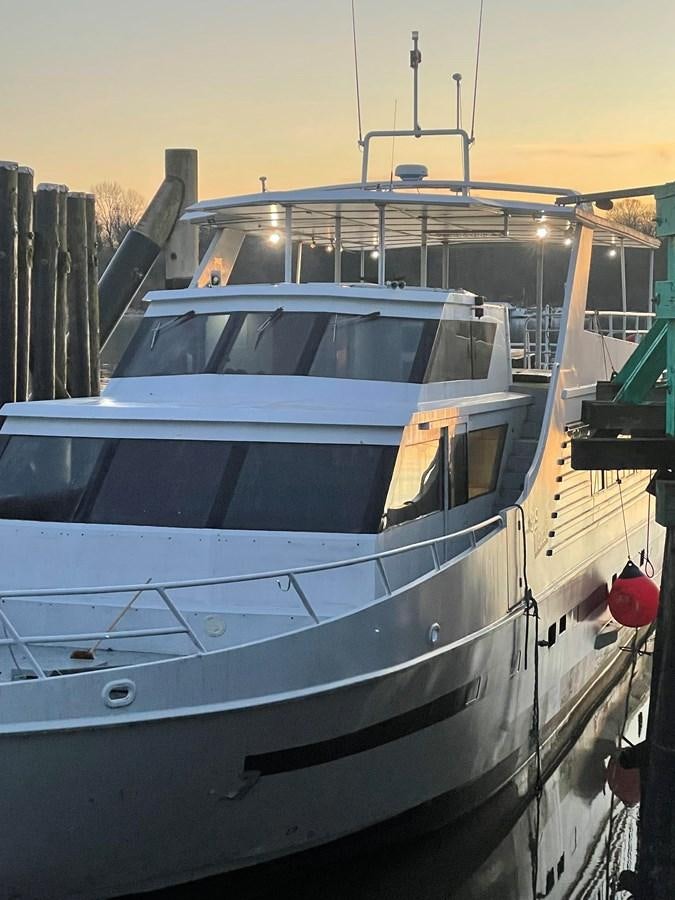 a boat parked in a harbor aboard MAGIC MOMENT Yacht for Sale