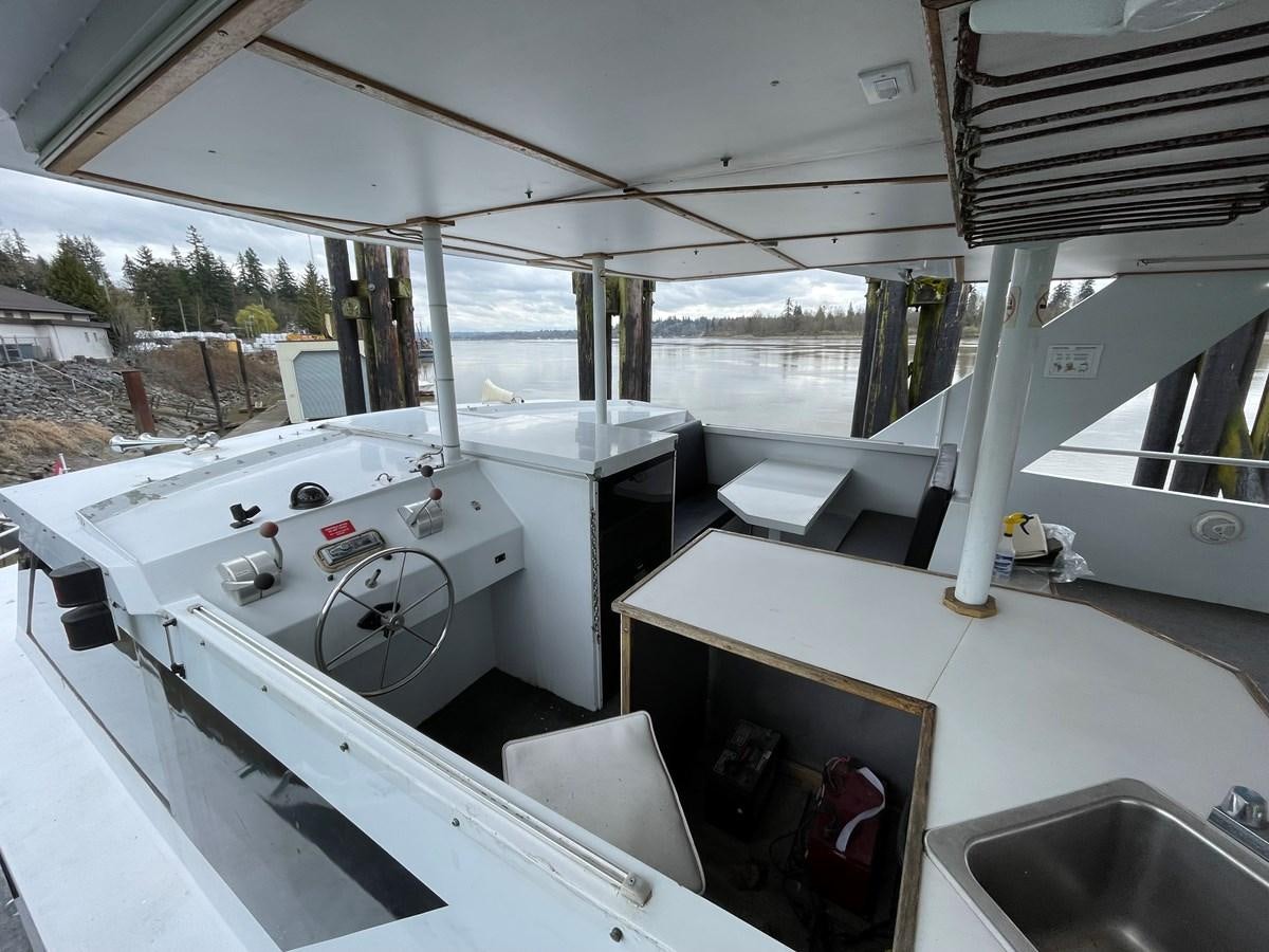 a view of a large room with a sink and a large window aboard MAGIC MOMENT Yacht for Sale