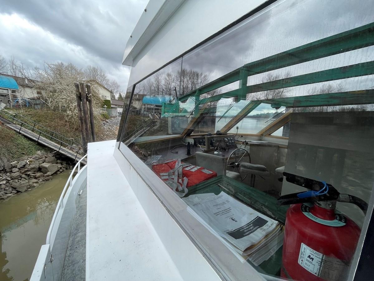 a car with a door open aboard MAGIC MOMENT Yacht for Sale