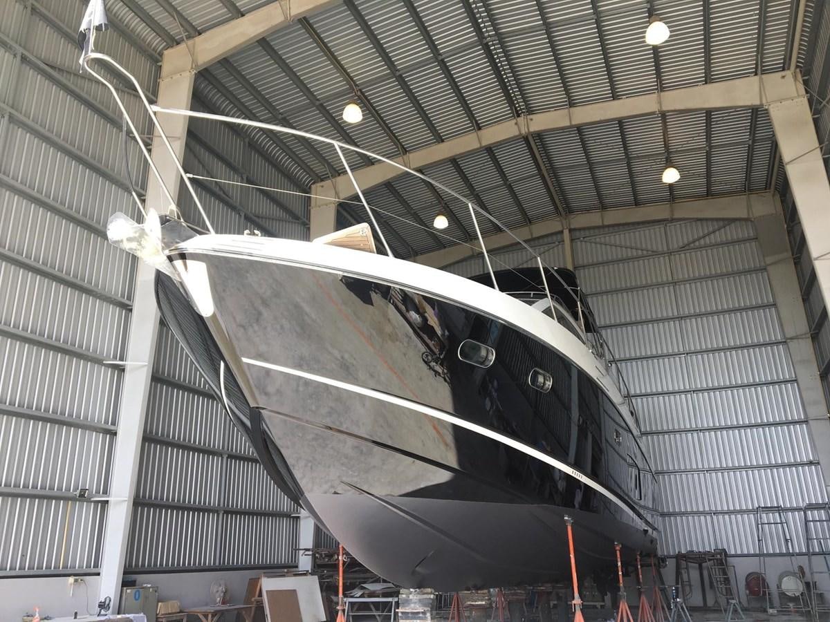 a large metal object in a building aboard OSCA Yacht for Sale