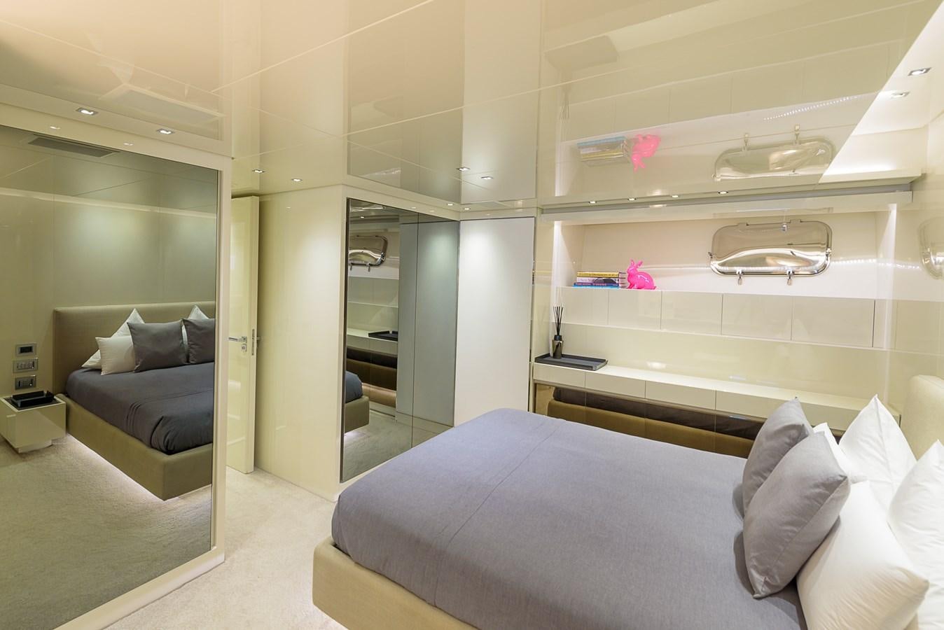a room with a bed and a couch aboard MUSHA Yacht for Sale