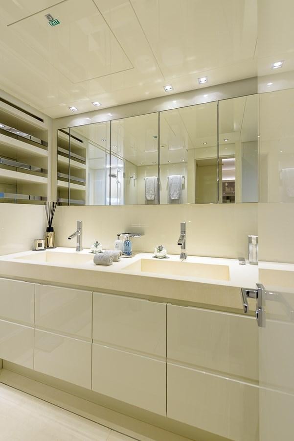 a bathroom with a large mirror aboard MUSHA Yacht for Sale