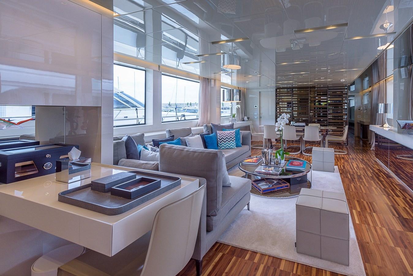 a living room with a large window aboard MUSHA Yacht for Sale