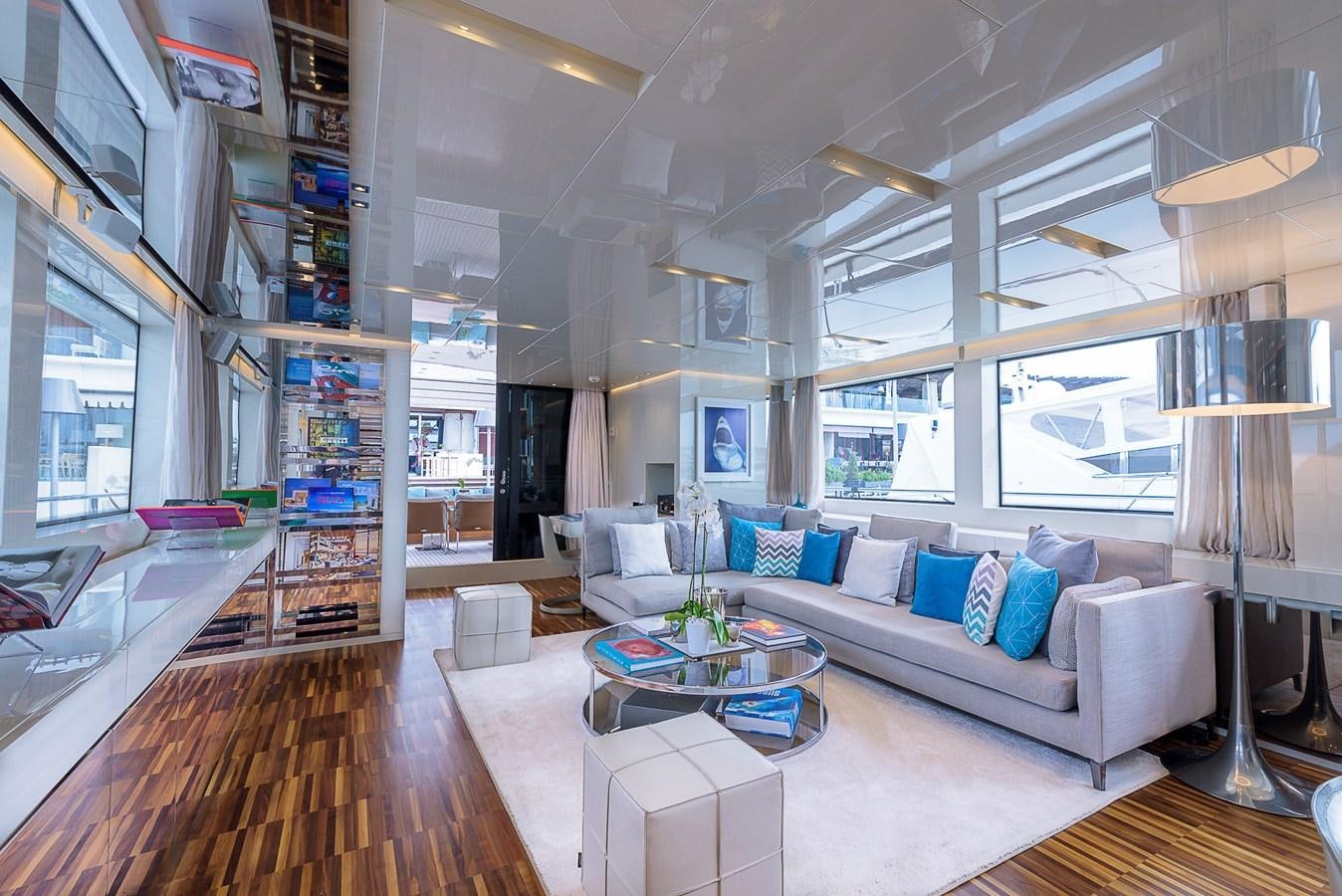 a living room with a large window aboard MUSHA Yacht for Sale