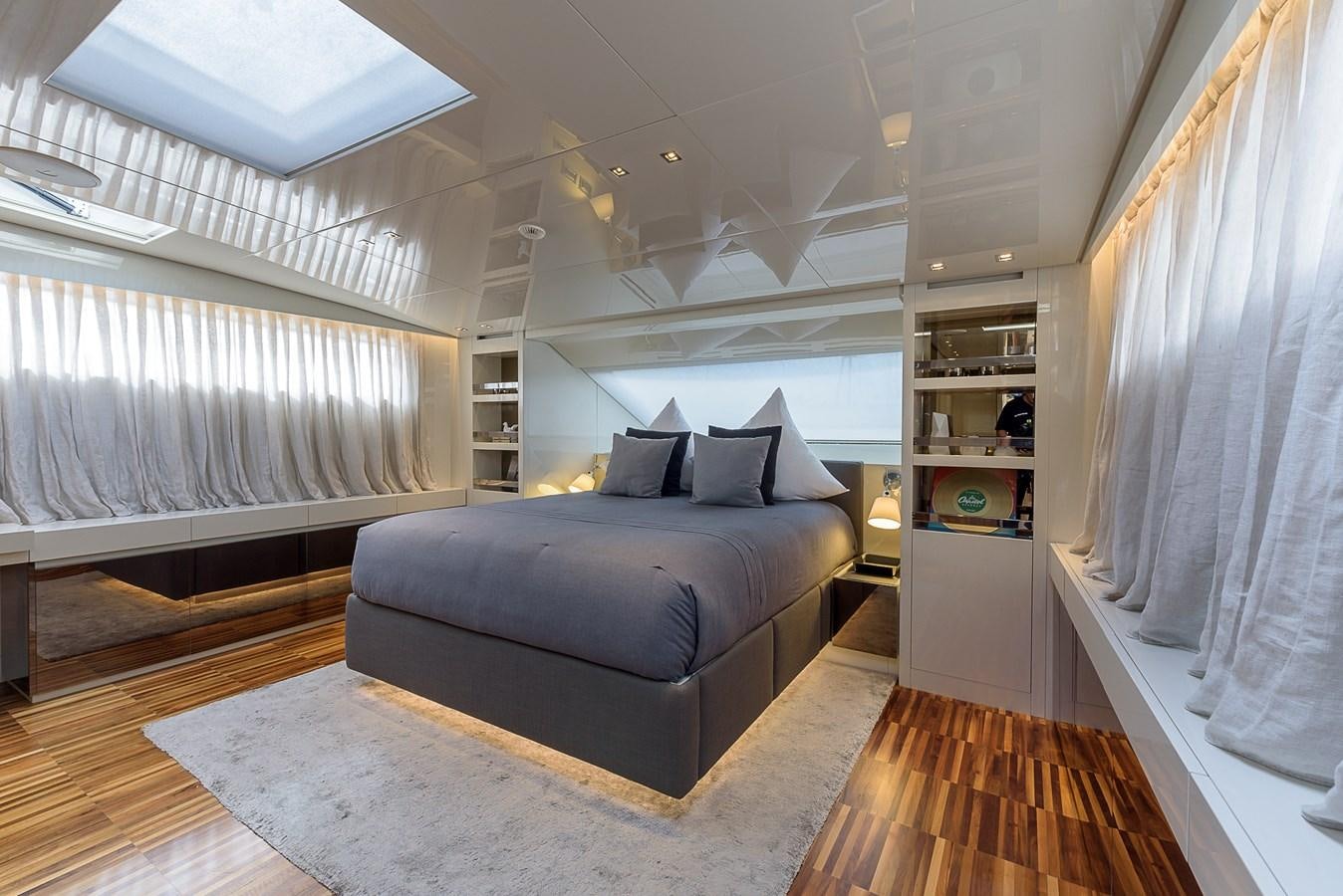 a large bedroom with a large bed aboard MUSHA Yacht for Sale