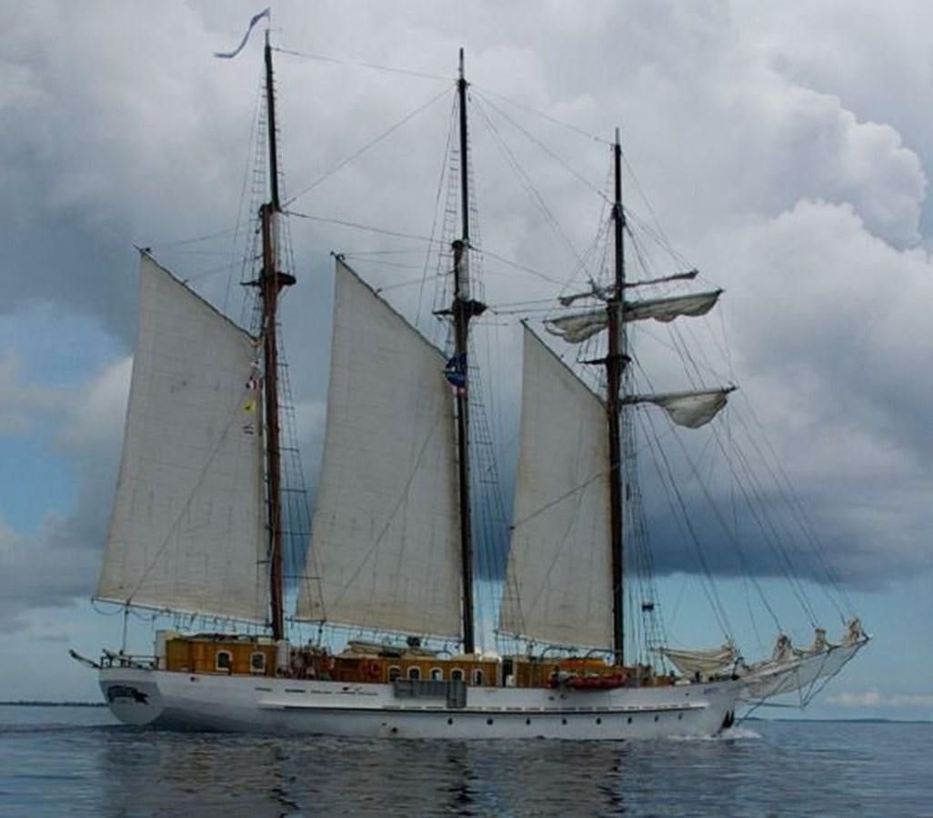 a large ship in the water aboard MYSTIC Yacht for Sale