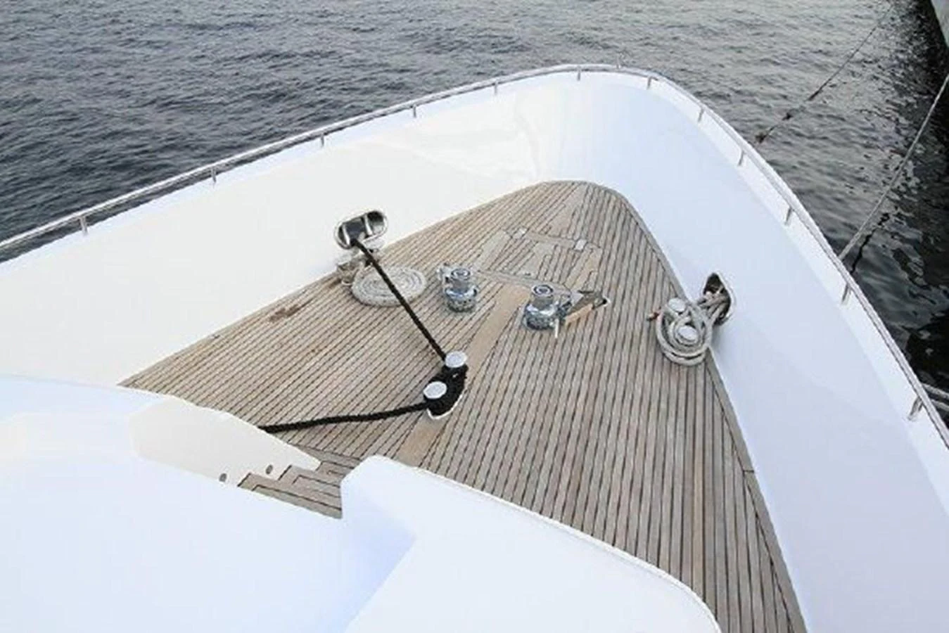 a boat with a fishing pole aboard WHITE LOTUS Yacht for Sale