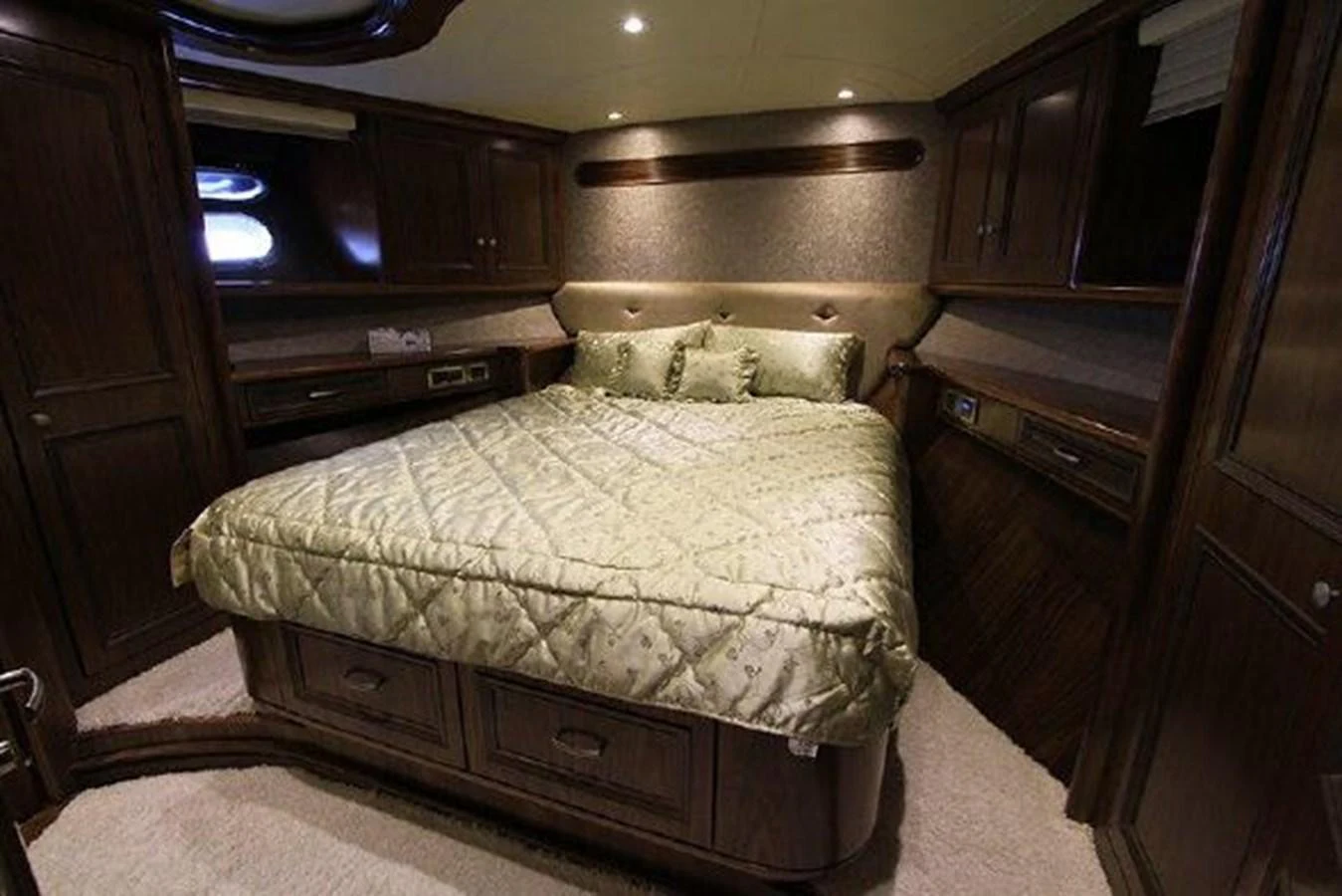 a bed in a room aboard WHITE LOTUS Yacht for Sale