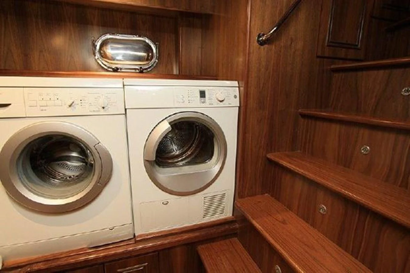 a white washing machine aboard WHITE LOTUS Yacht for Sale