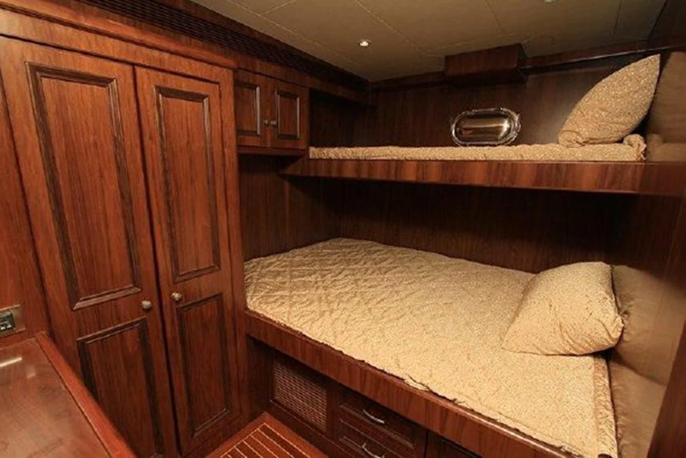 a bed in a room aboard WHITE LOTUS Yacht for Sale