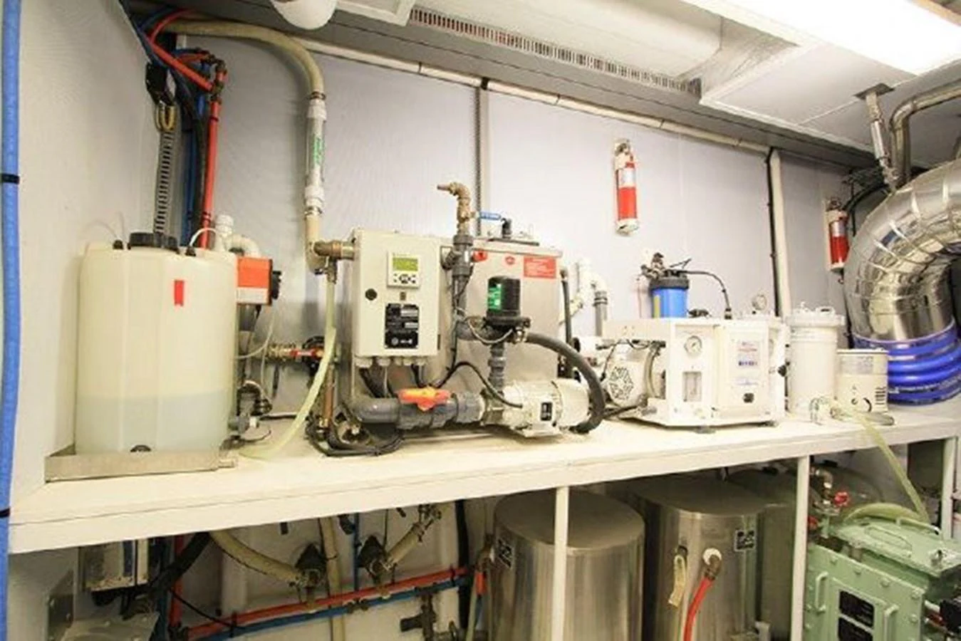 a white machine with wires aboard WHITE LOTUS Yacht for Sale