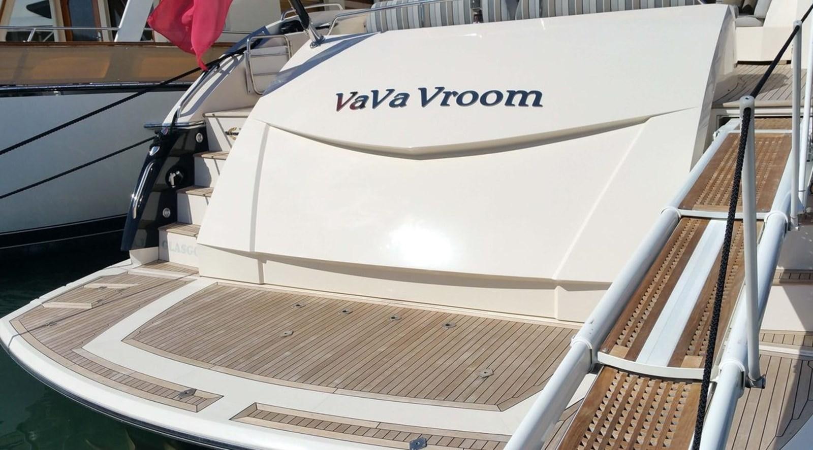 a white boat with a white cover aboard VA VA VROOM Yacht for Sale
