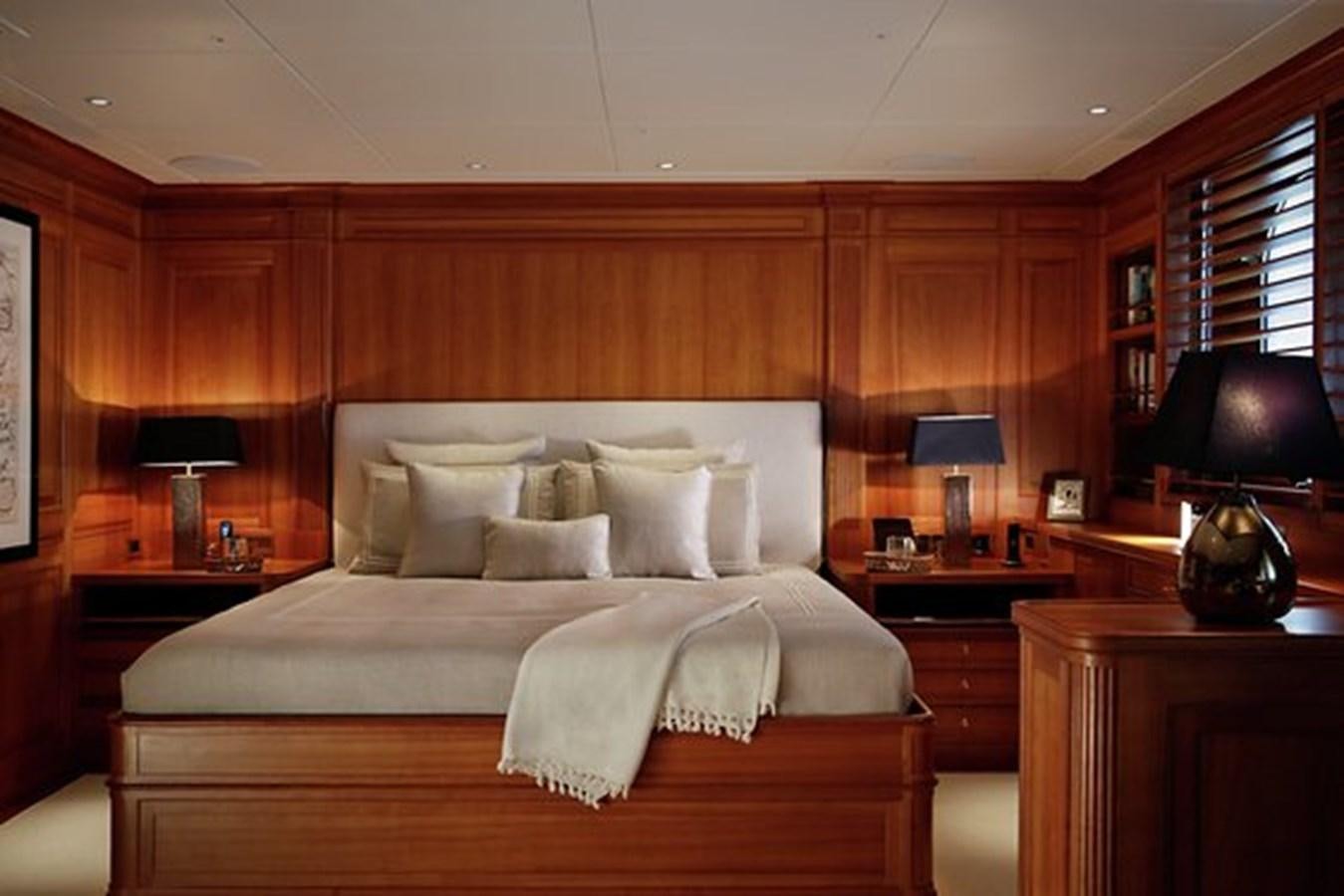 a bed in a room aboard LA LUNA Yacht for Sale