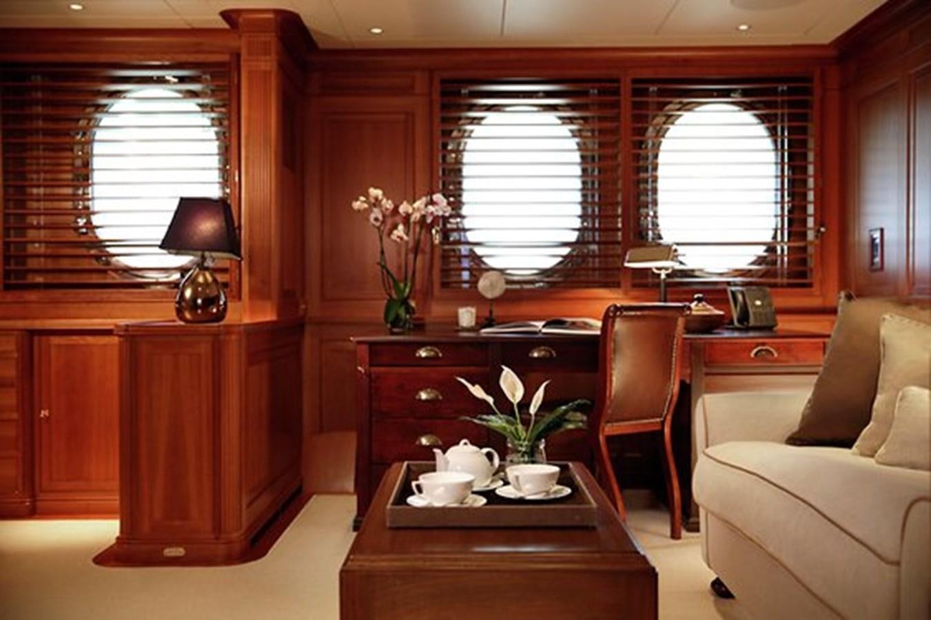 a room with a desk and a chair aboard LA LUNA Yacht for Sale