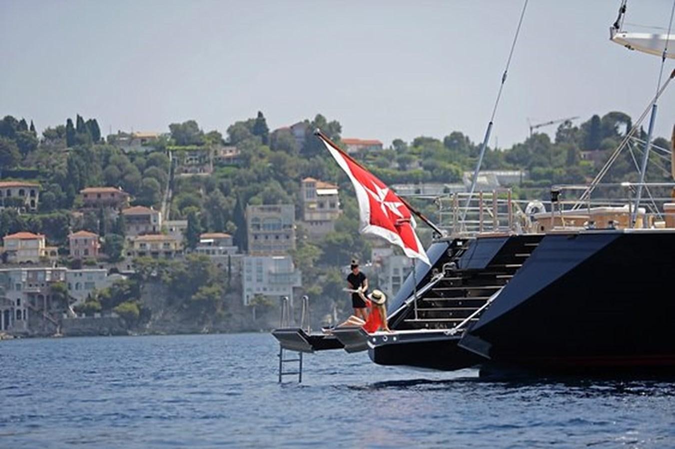 a couple of men on a boat aboard LA LUNA Yacht for Sale