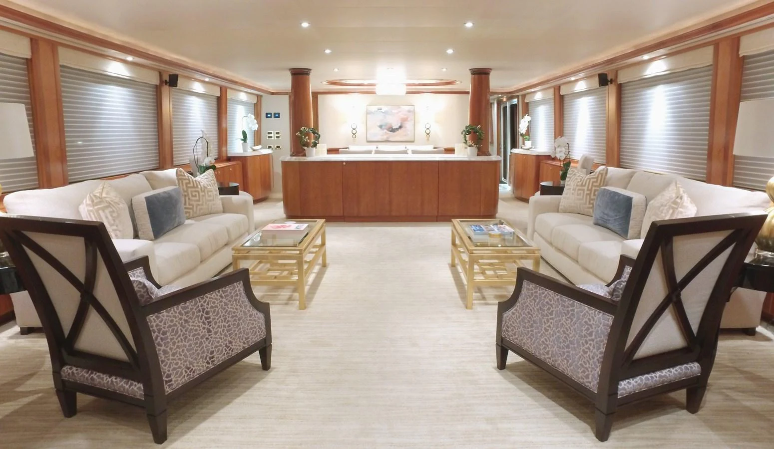 a living room with a couch and a piano aboard SHORT GAME Yacht for Sale
