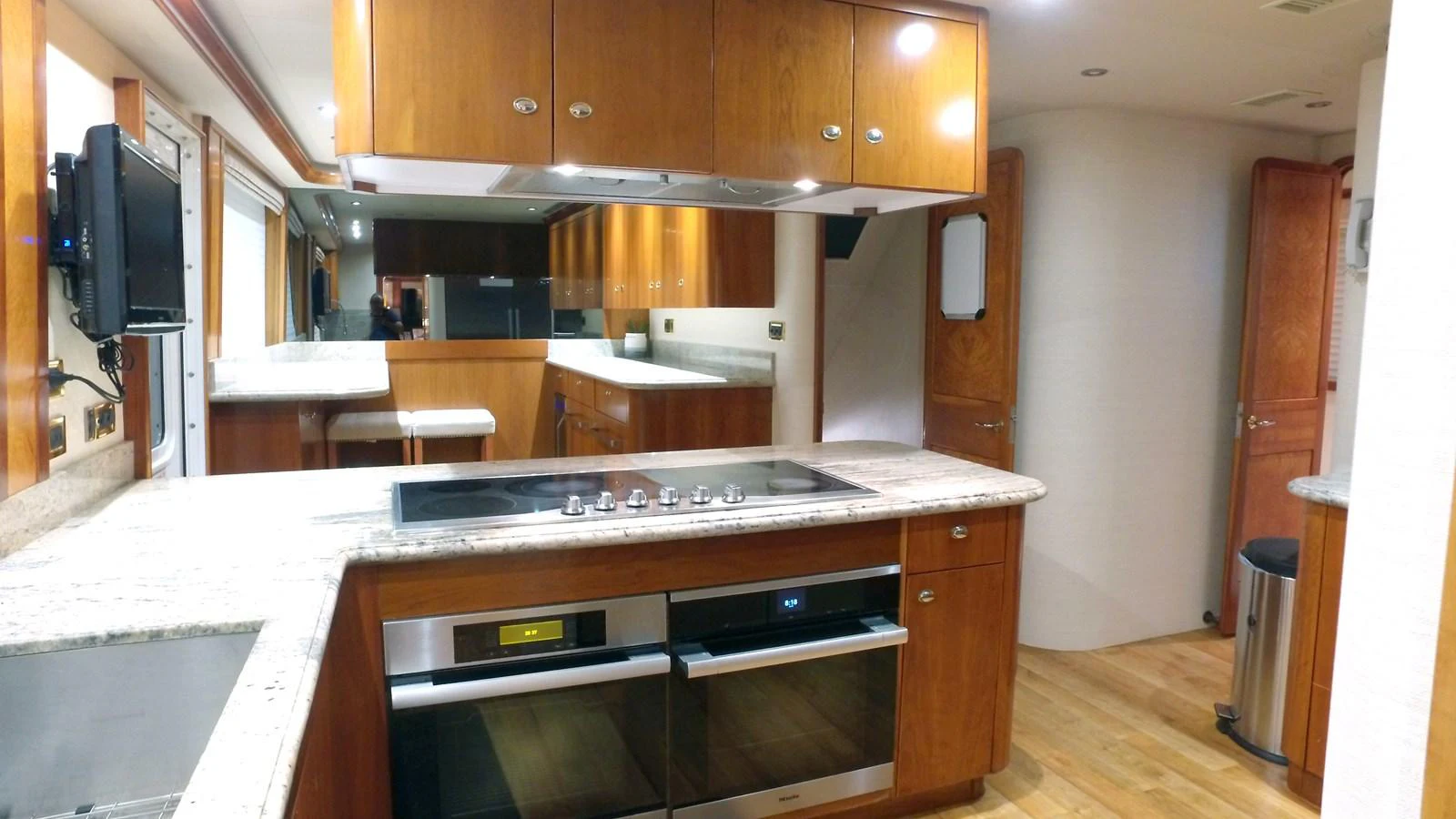 a kitchen with a stove and oven aboard SHORT GAME Yacht for Sale
