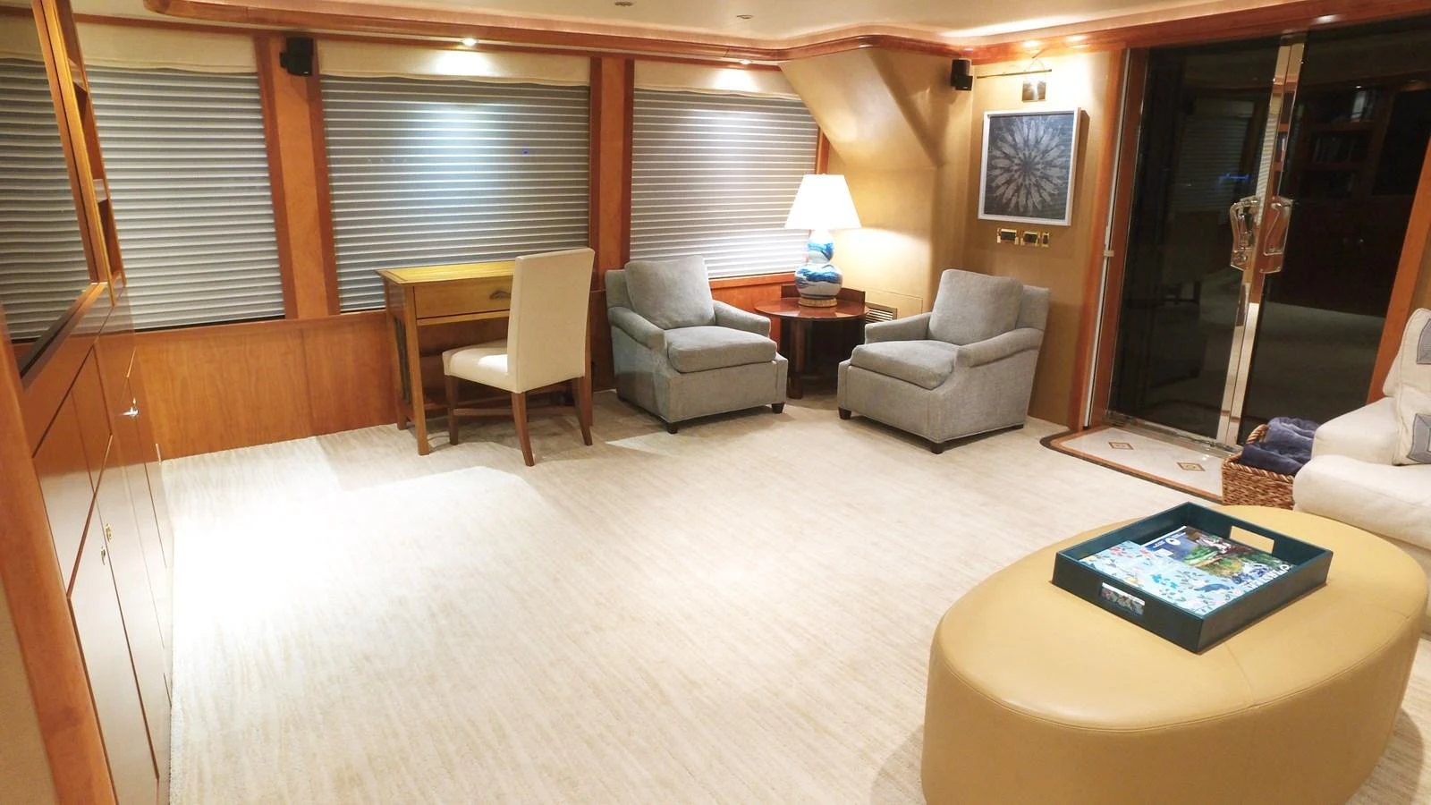 a living room with a large window aboard SHORT GAME Yacht for Sale