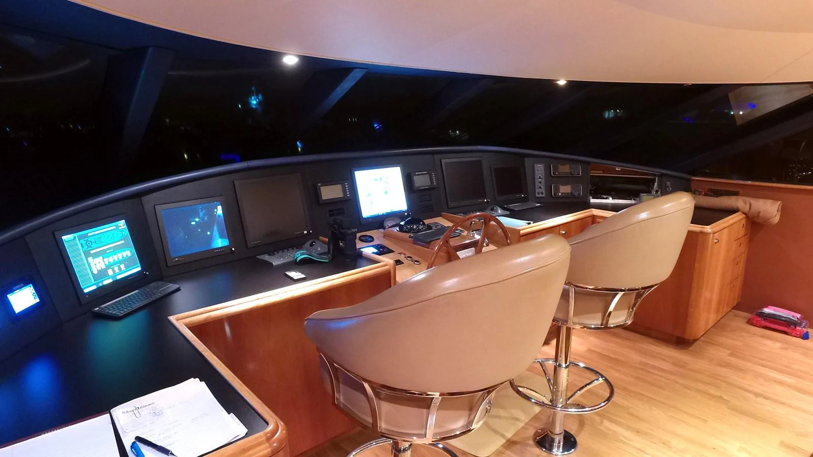 a room with computers and monitors aboard SHORT GAME Yacht for Sale