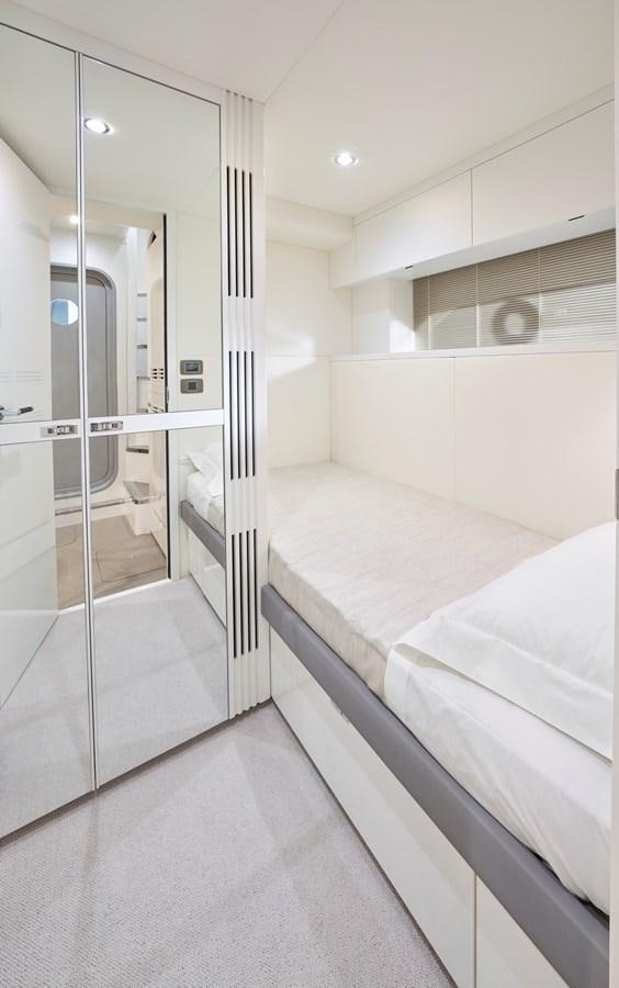 a large bathroom with a glass shower aboard ROVAL Yacht for Sale