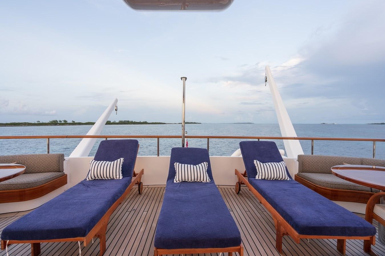 a group of chairs on a boat aboard BIG EASY Yacht for Charter