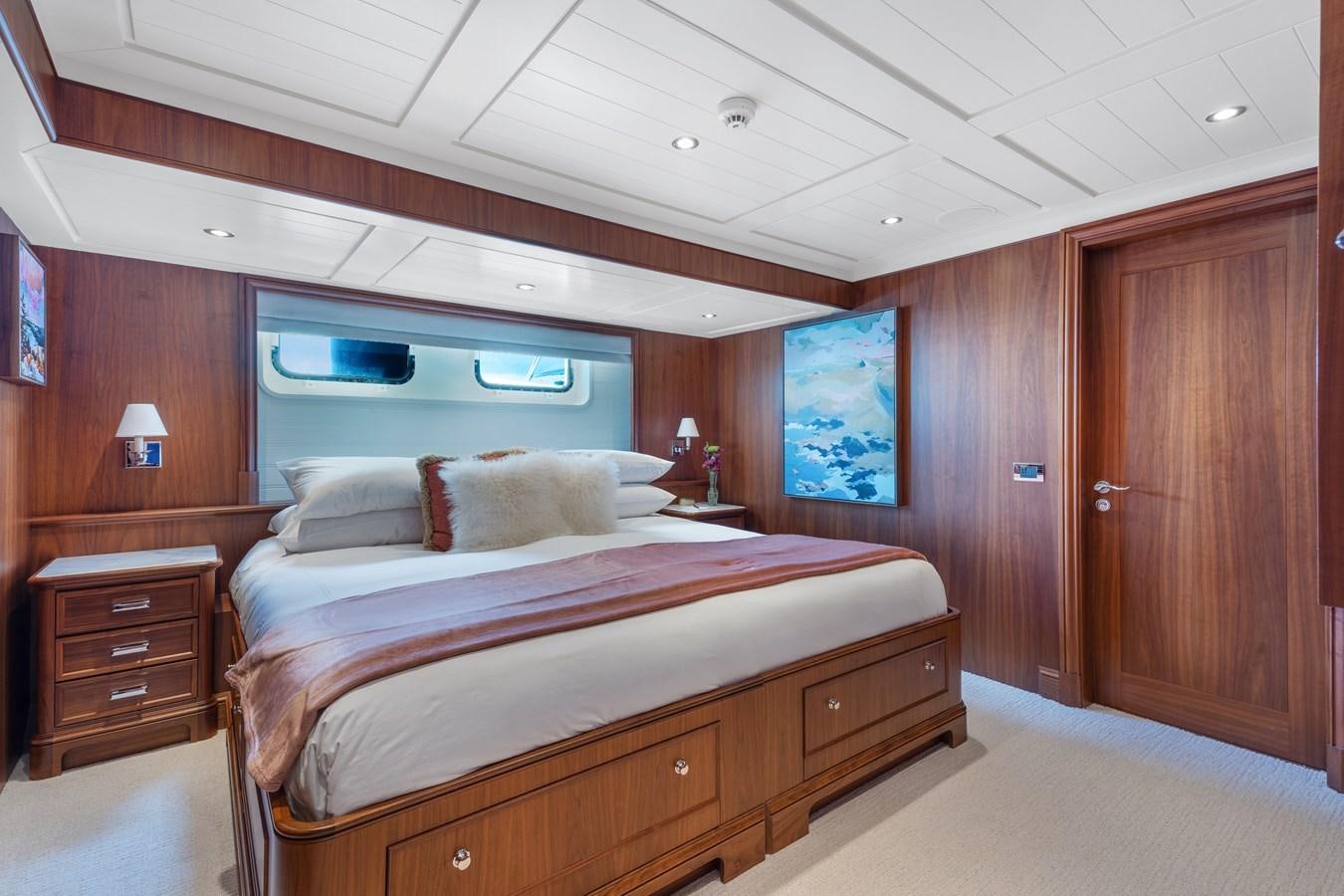 a bed in a cabin aboard BIG EASY Yacht for Charter