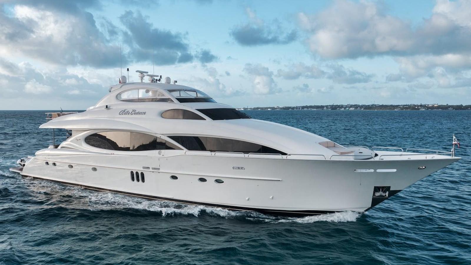 a white yacht in the water aboard BELLA CONTESSA Yacht for Sale