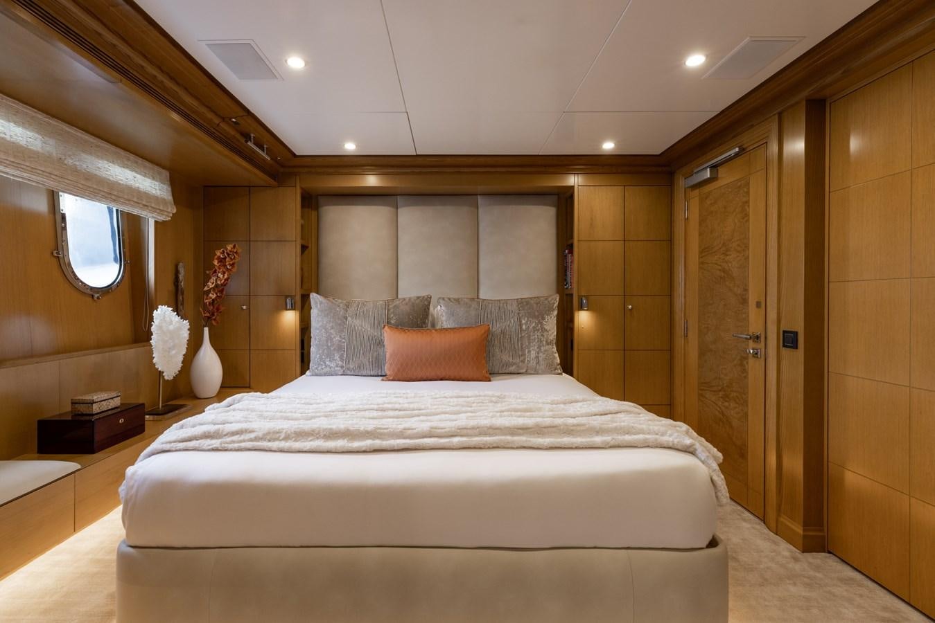 a large bed in a room aboard TREEHOUSE Yacht for Sale