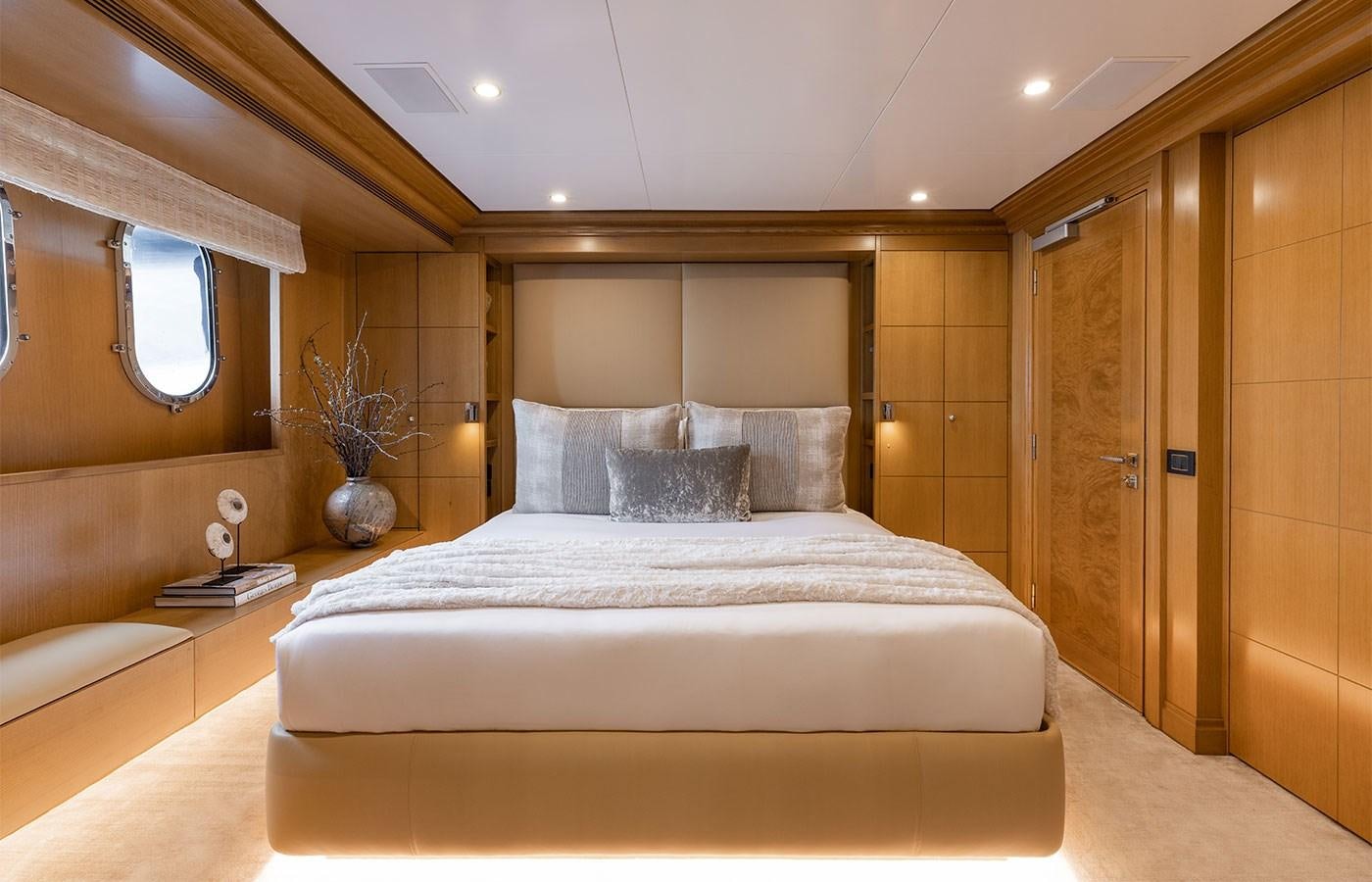 a bed in a room aboard TREEHOUSE Yacht for Sale