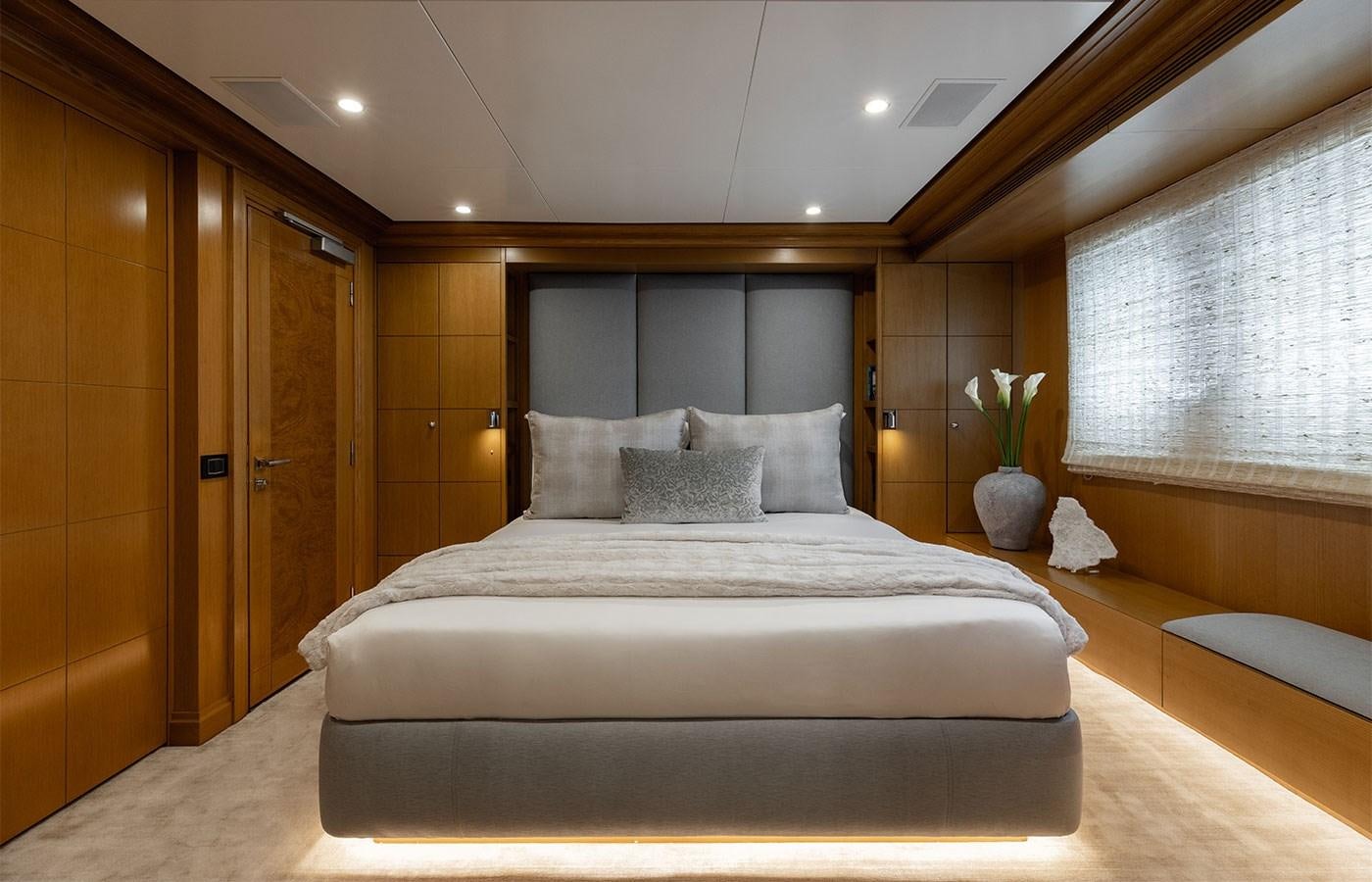 a large bed in a room aboard TREEHOUSE Yacht for Sale