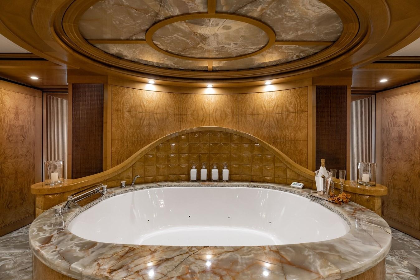 a large bathroom with a large bathtub aboard TREEHOUSE Yacht for Sale