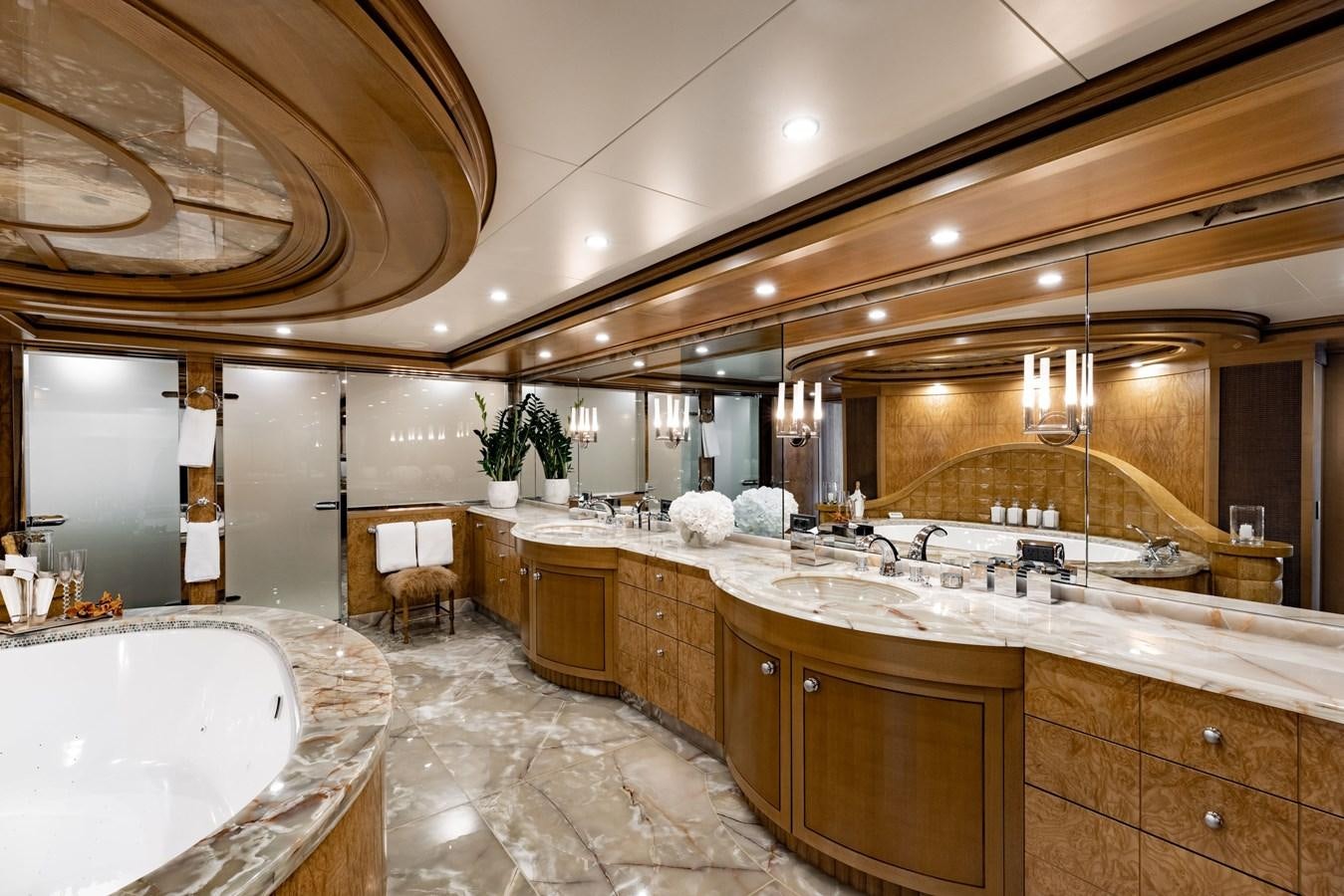 a large bathroom with marble counters aboard TREEHOUSE Yacht for Sale