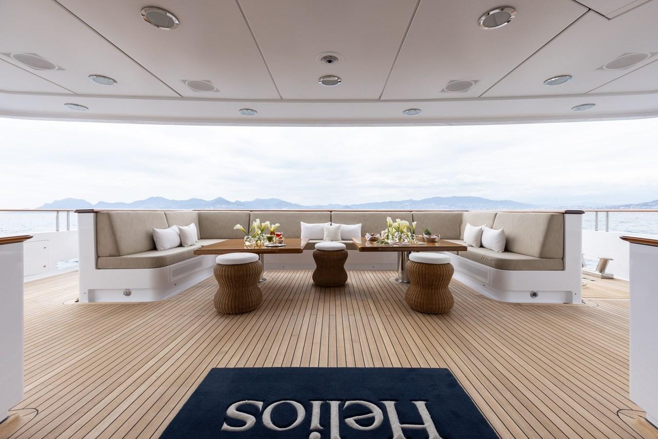 a living room with a couch and a table aboard TREEHOUSE Yacht for Sale