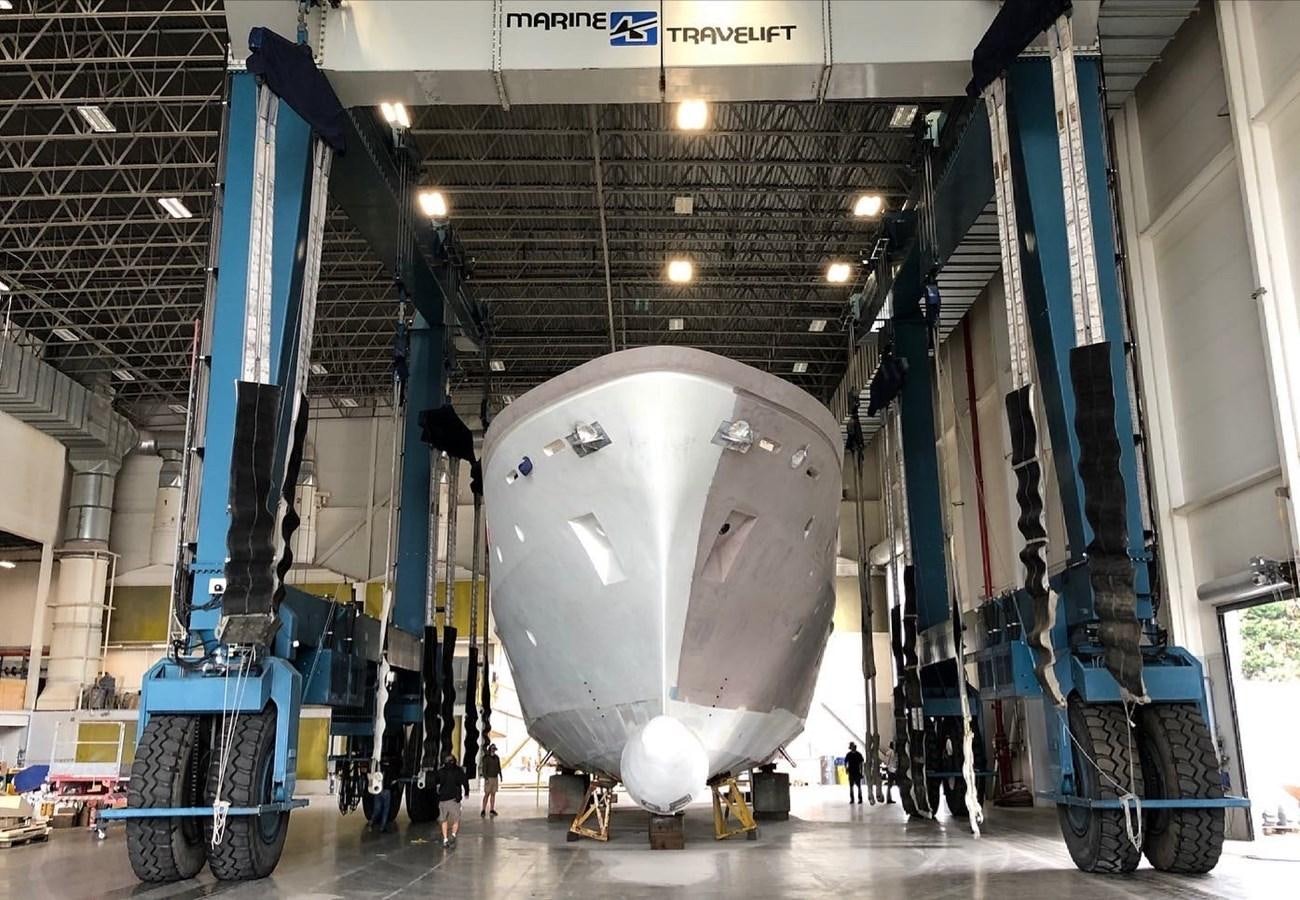 a machine in a factory aboard CUSTOM 112 Yacht for Sale