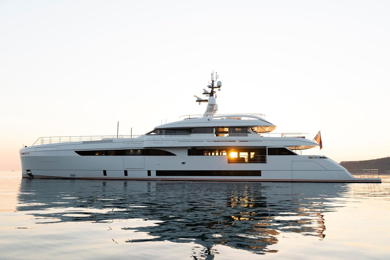 a white yacht on water aboard STERN Yacht for Sale