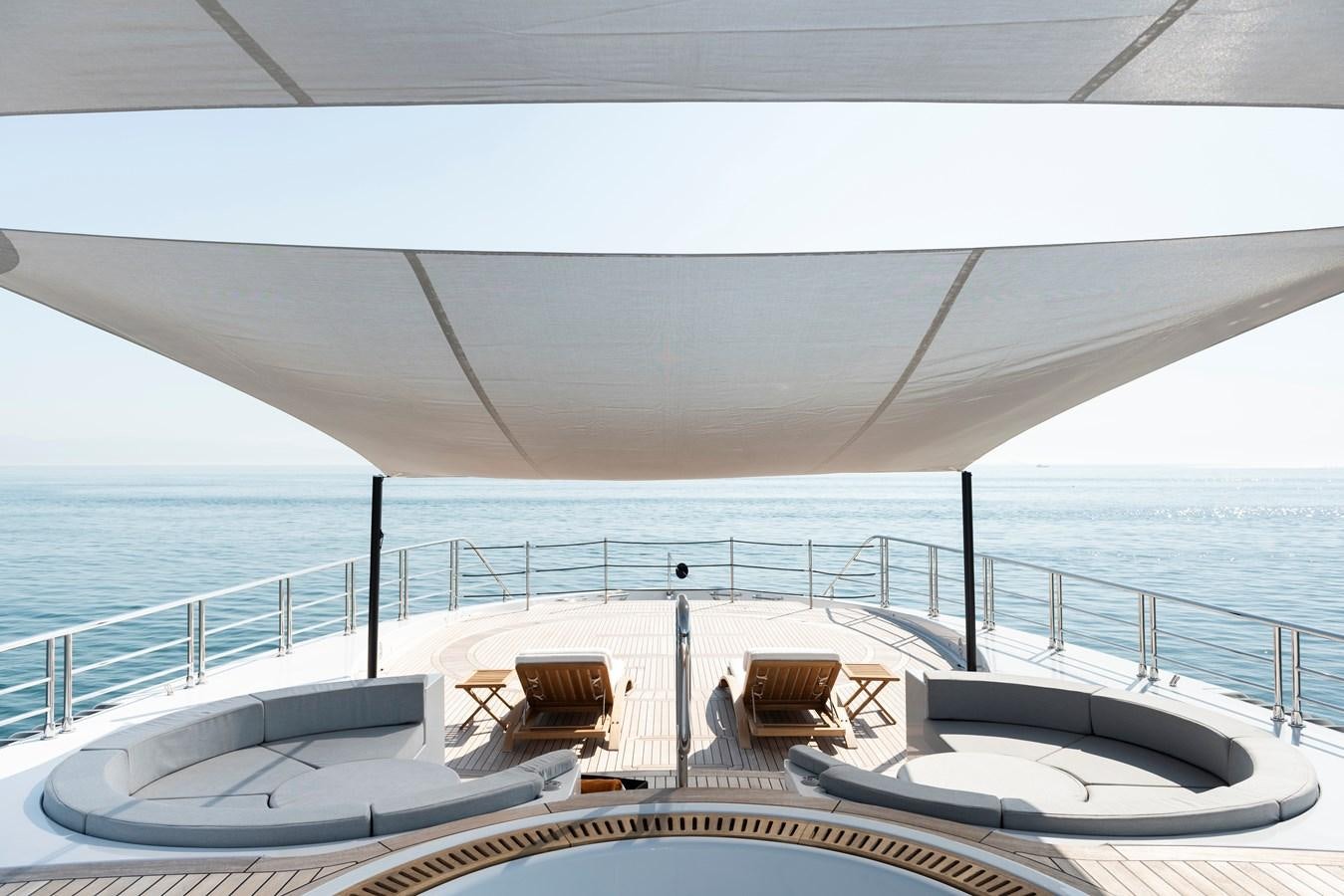 a lounge area on a boat aboard STERN Yacht for Sale