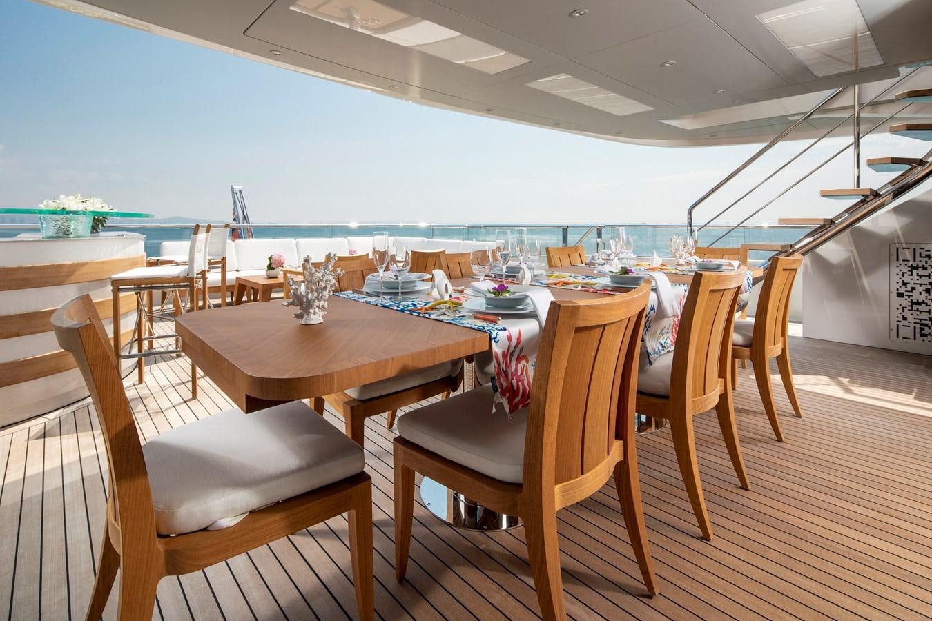 a table set for a meal aboard STERN Yacht for Sale
