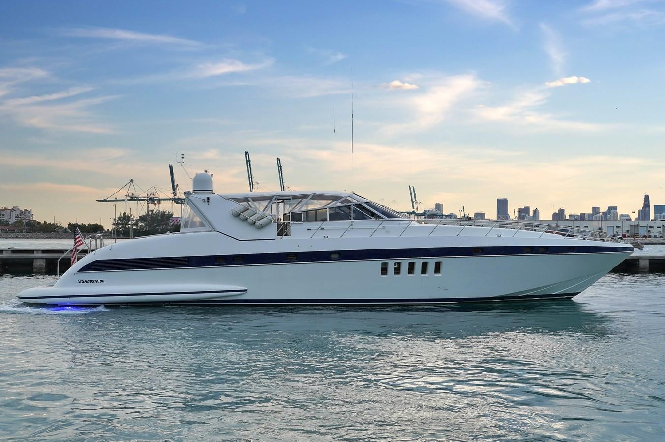 a white yacht on the water aboard HAKUNA MATATA Yacht for Sale