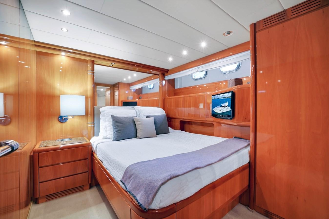 a bed in a cabin aboard HAKUNA MATATA Yacht for Sale