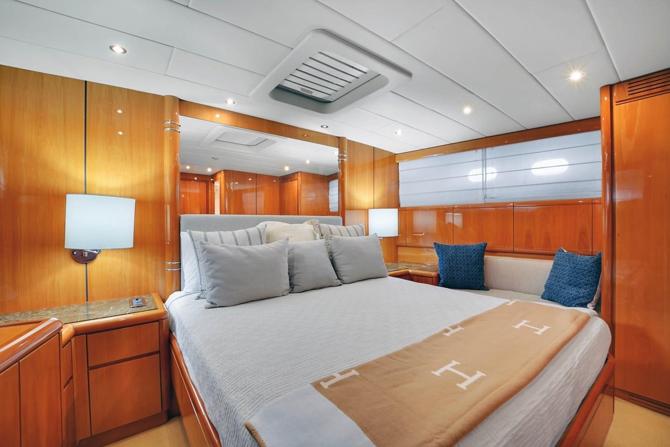 a bed in a room aboard HAKUNA MATATA Yacht for Sale