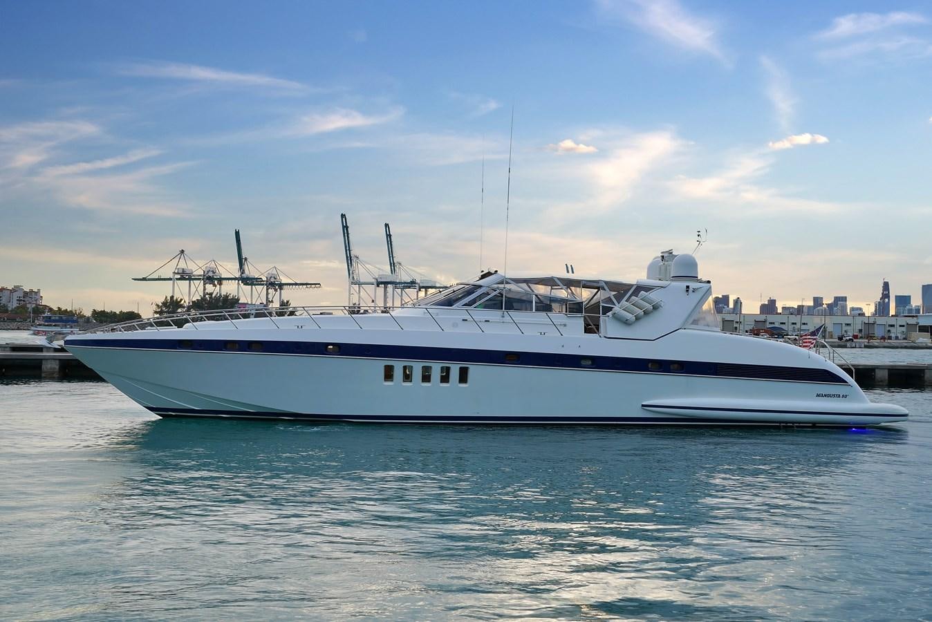 a large white boat in the water aboard HAKUNA MATATA Yacht for Sale