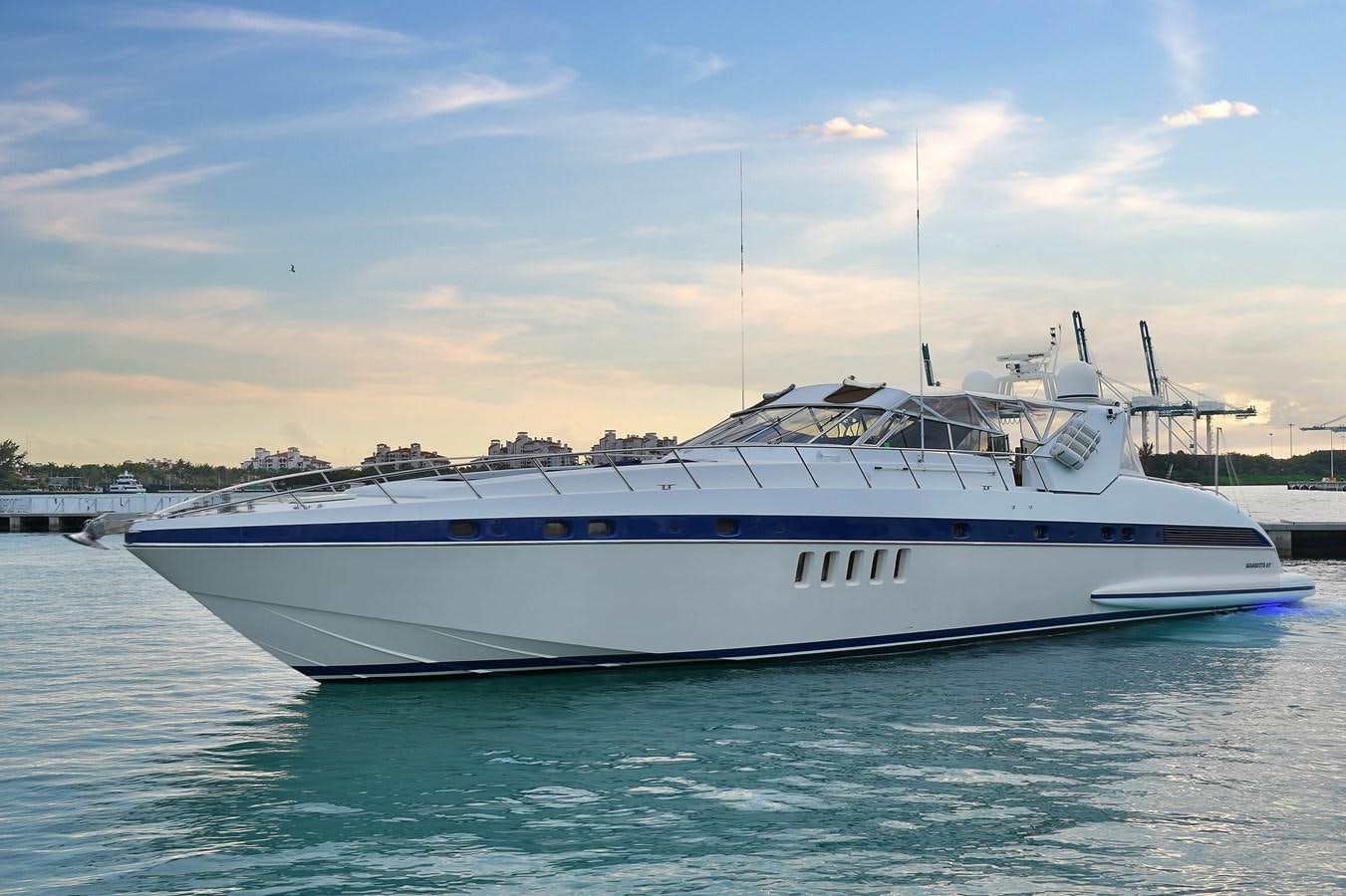 a white boat in the water aboard HAKUNA MATATA Yacht for Sale