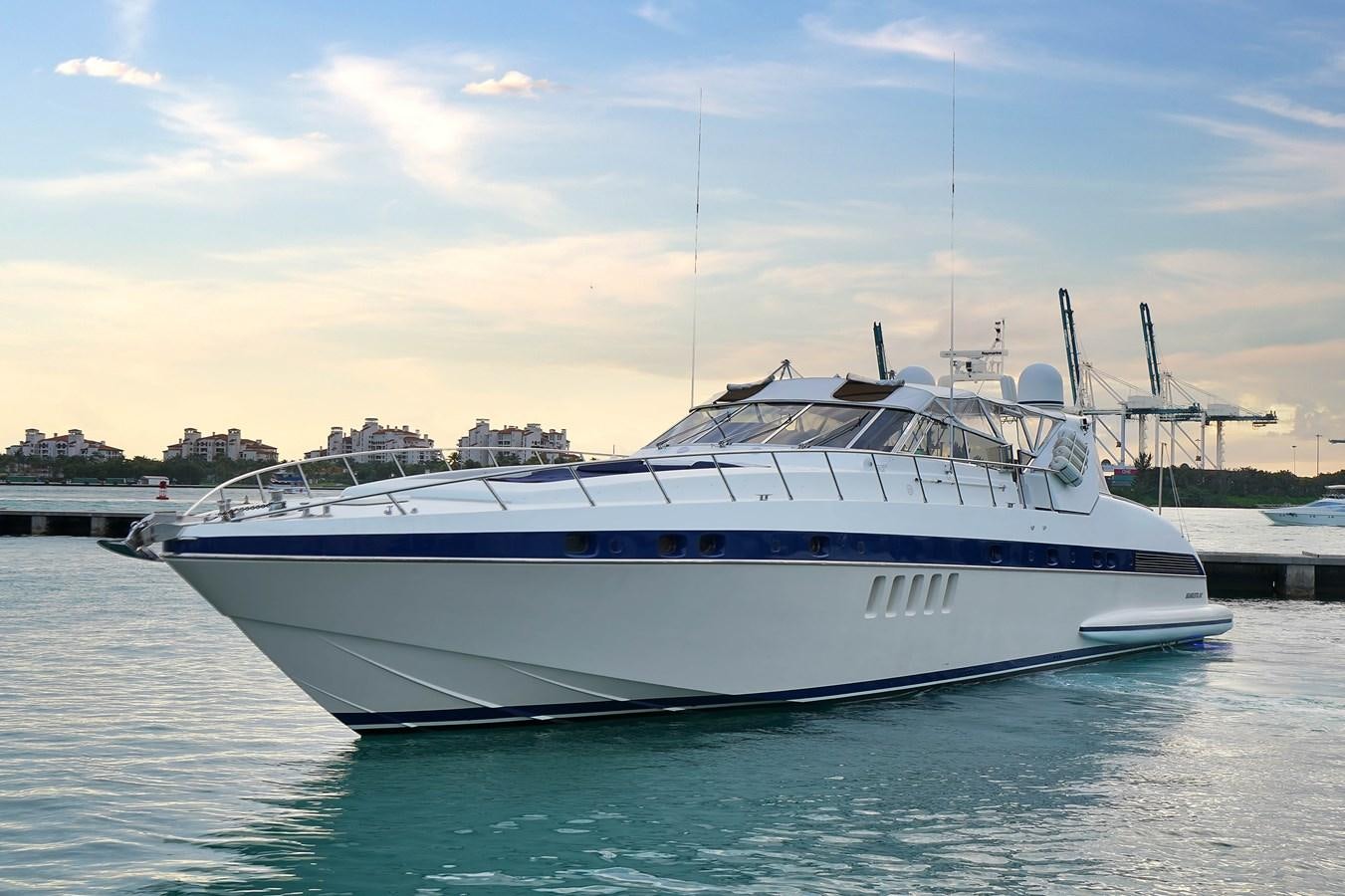 a white yacht in the water aboard HAKUNA MATATA Yacht for Sale