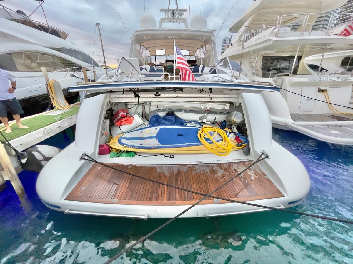 a boat is parked in the water aboard HAKUNA MATATA Yacht for Sale