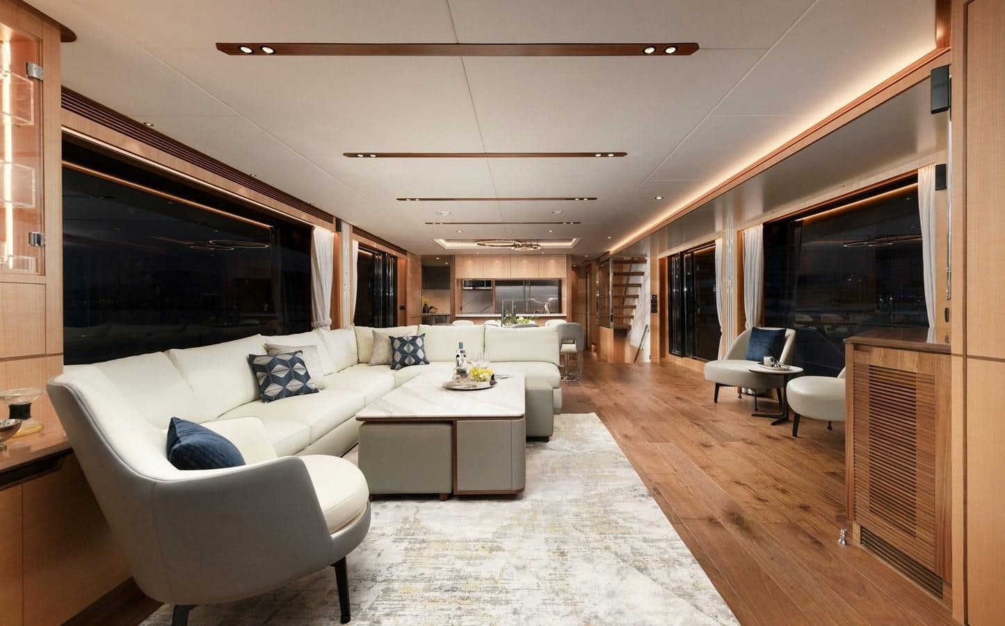 a living room with a large window aboard CHRISTINE Yacht for Sale