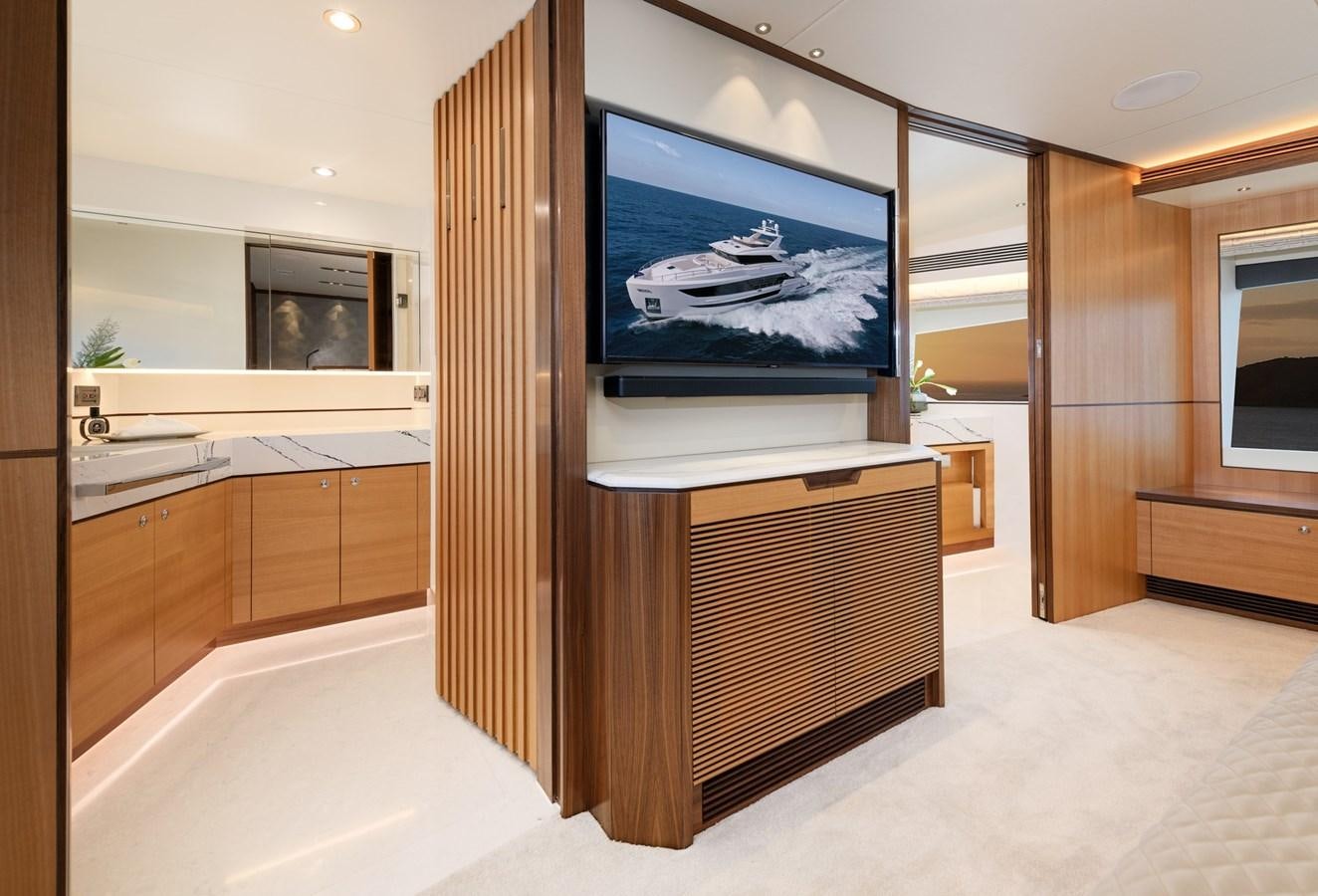 a large tv in a bathroom aboard CHRISTINE Yacht for Sale